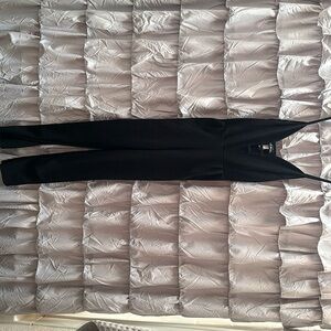 Black romper. Worn twice. Like new.